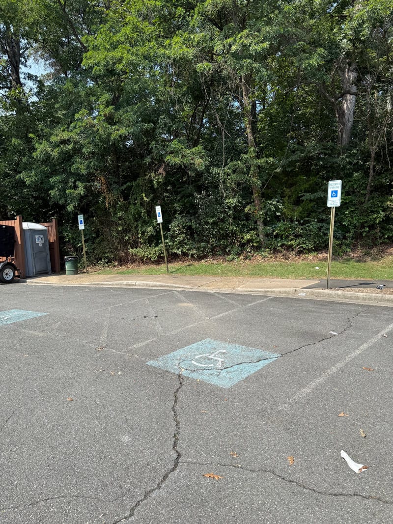 Accessible parking spaces marked with the international accessibility symbol at Tuscarora Park