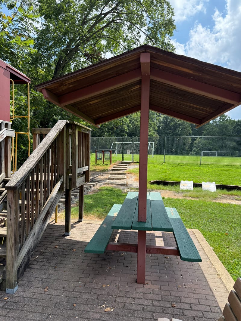 A paved park trail representing the parks near SPARC Arlington