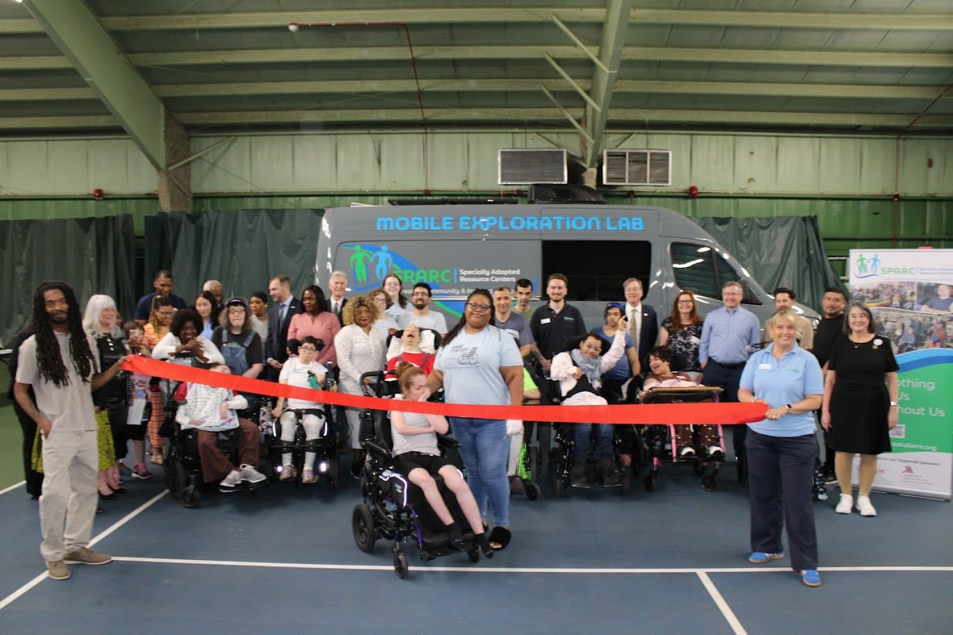 SPARC participants, families, staff, and elected officials gathered with the Mobile Exploration Lab van for the Hybla Valley center ribbon cutting